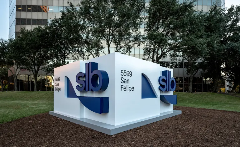 The entrance to oilfield service provider SLB's office in Houston, Texas, showing the former Schlumberger's new name and logo, is seen in this handout image taken June 2023. Courtesy of SLB/Handout via