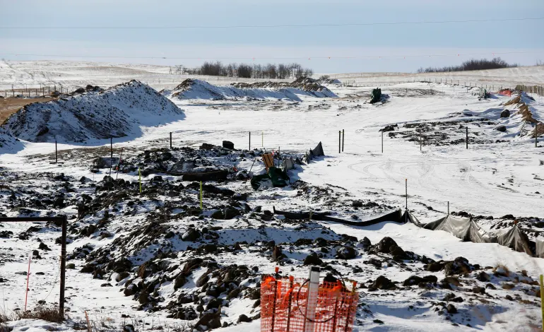 The route of the Keystone XL crude oil pipeline lies idle through a farmer's field after construction stopped near Oyen, Alberta, Canada February 1, 2021.  Todd Korol/