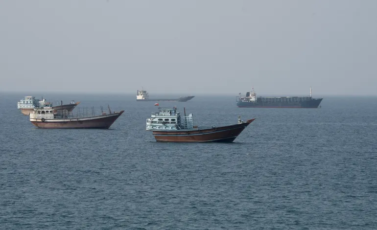 Vessels near the Strait of Hormuz, as seen from Musandam, Oman, August 17, 2026. Stringer