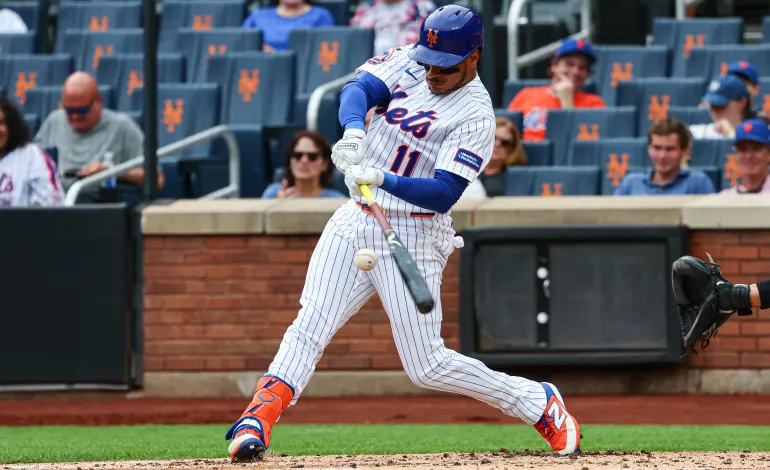 Aug 16, 2026; New York City, New York, USA;  New York Mets designated hitter Jorge Polanco (11) singles during the second inning against the Washington Nationals at Citi Field. Mandatory Credit: Vincent Carchietta-Imagn Images