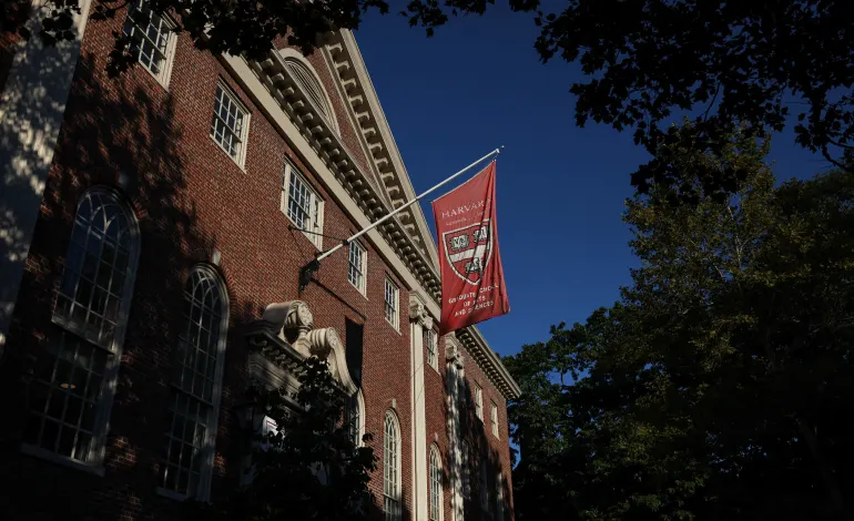 A flag hangs on campus at Harvard University in Cambridge, Massachusetts, U.S., September 4, 2025. REUTERS/Shannon Stapleton