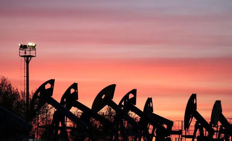 Sunset clouds glow over pump jacks at the Airankol oil field operated by Caspiy Neft in the Atyrau region, Kazakhstan, April 21, 2026. Pavel Mikheyev