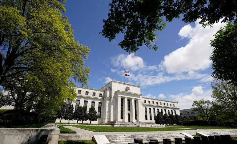 The Federal Reserve building is set against a blue sky in Washington, U.S., May 1, 2020. Kevin Lamarque