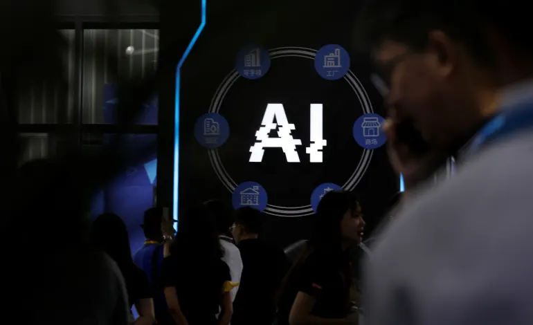 Visitors stand near a sign of artificial intelligence at an AI robot booth at Security China, an exhibition on public safety and security, in Beijing, China June 7, 2023. REUTERS/Florence Lo