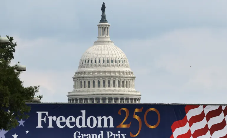 The U.S. Capitol stands beyond a banner for the weekend's Freedom 250 Grand Prix IndyCar series race in Washington, D.C., U.S., August 18, 2026. REUTERS/Kevin Lamarque