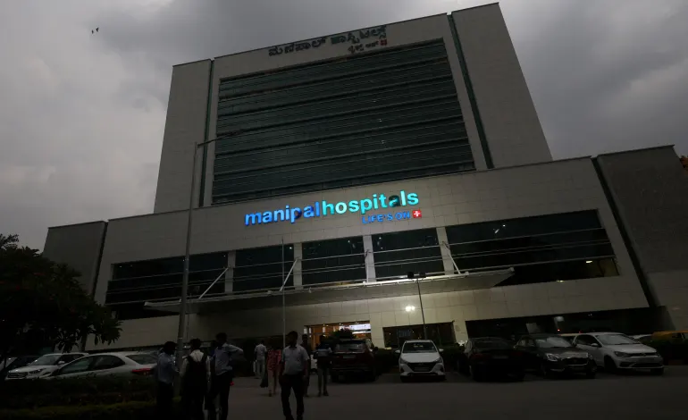 People stand inside the premises of Manipal Hospital in Bengaluru, India, May 26, 2026. Priyanshu Singh
