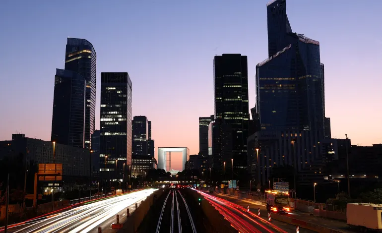 A view shows the financial and business district of La Defense in Puteaux near Paris, June 23, 2026. Picture taken with a long exposure. Abdul Saboor