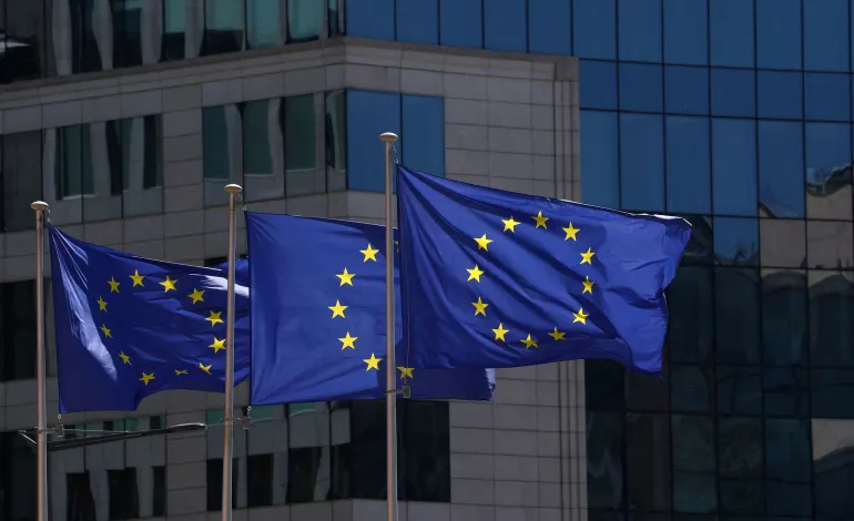 European Union flags flutter outside the European Commission headquarters in Brussels, Belgium April 29, 2026. REUTERS/Yves Herman/File Photo